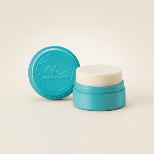 Utena Matomage Hair Styling Stick Strong Hold 13g green circular container, professional Japanese hair wax for firm styling.