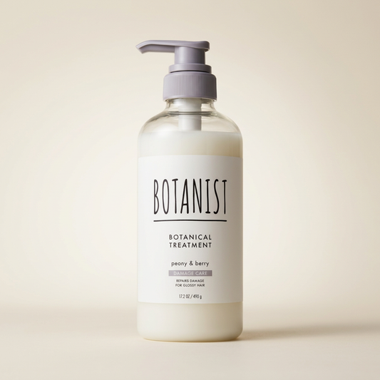 BOTANIST Botanical Treatment Damage Care 460ml minimalist white-labeled bottle with black pump and silver-grey accents, Japanese professional plant-derived repairing hair conditioner.